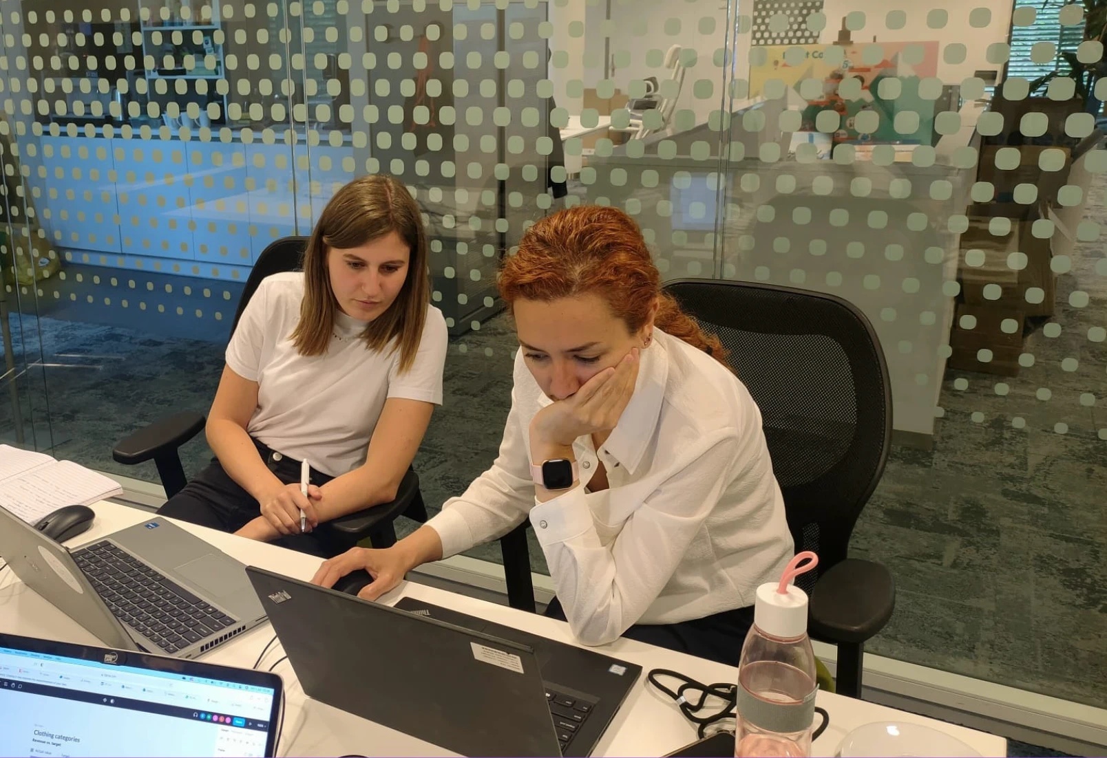 Working through the problems together on laptops